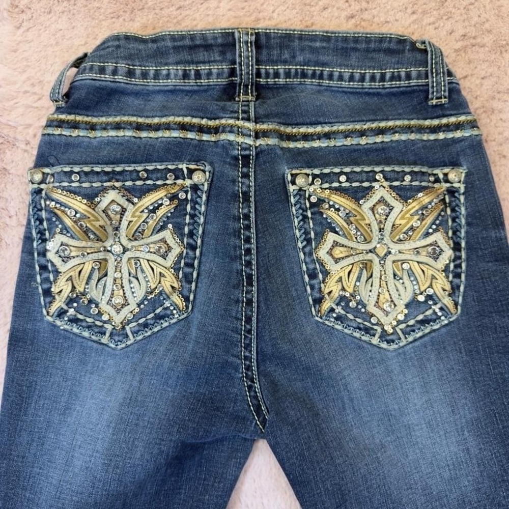 mid y2k embellished bootcut jeans by Sexy Couture